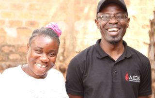 Alain Lazaret - Aegis Trust Representative in the Central African Republic - with a participant in an Aegis Peace Education Workshop