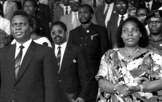 Agathe Habyarimana - right - with President Habyarimana and regime officials